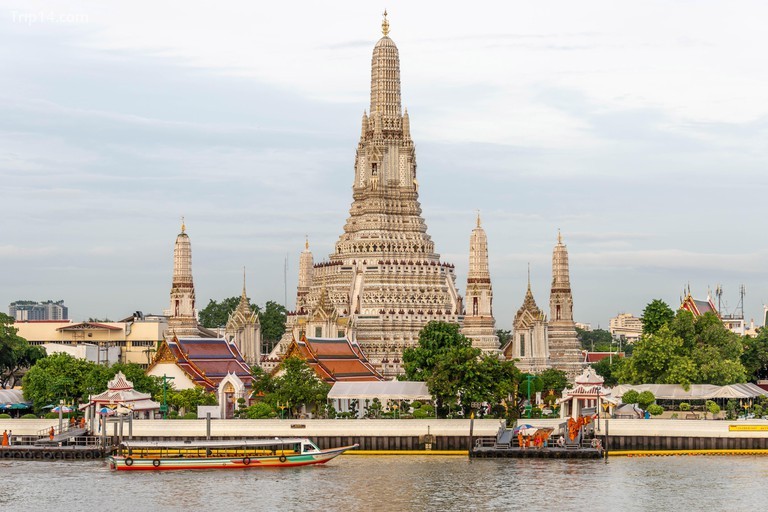 The landmark Wat Arun Buddhist Temple along the Chao Phraya River in Bangkok